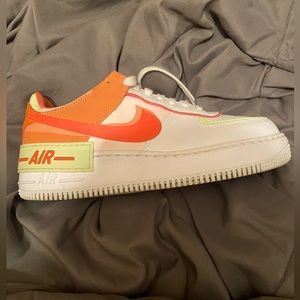 Nike Air Force 1 green and pink color way.